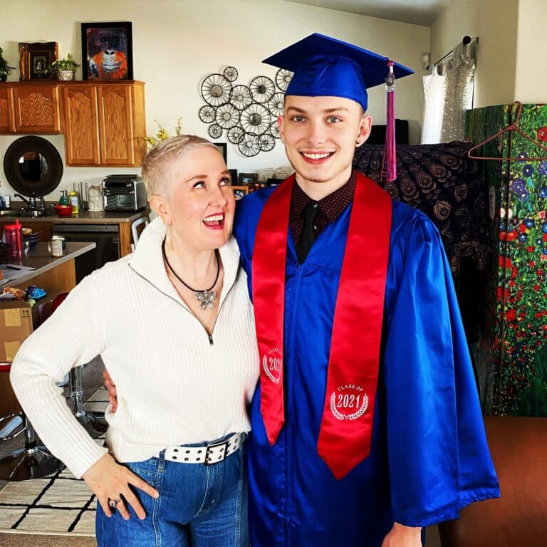 Man graduating in blue gown