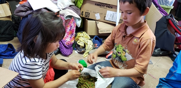 Two kids doing crafts together